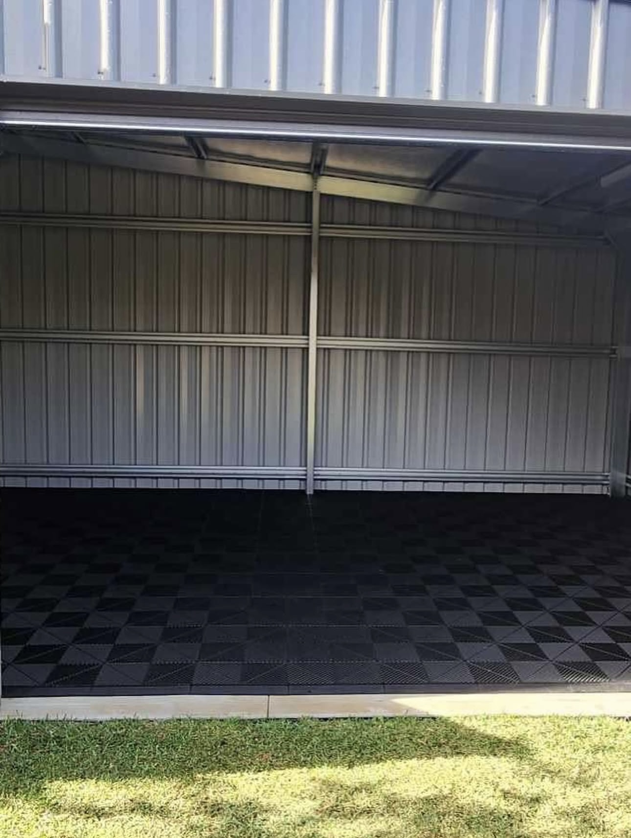 Double garage with black and charcoal garage tiles