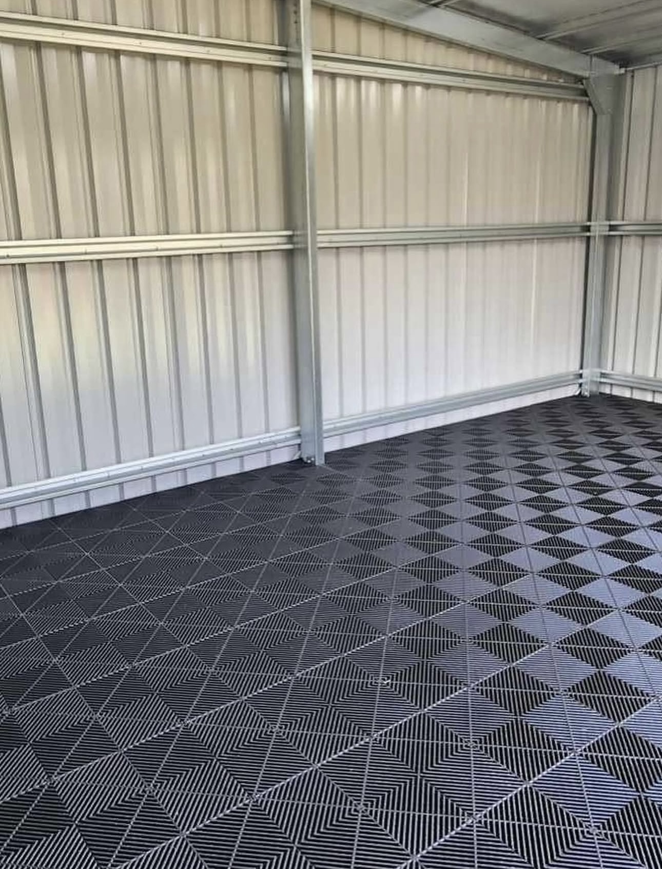 Shed with charcoal interlocking garage tiles