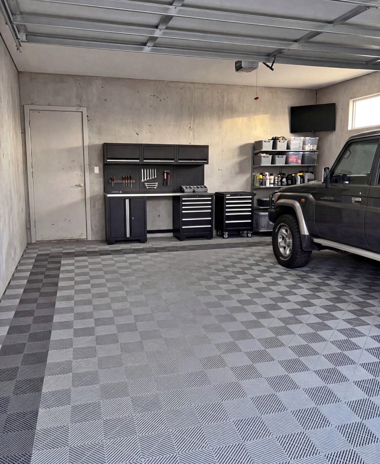 Home garage with Landcruiser and grey checkerboard tiles