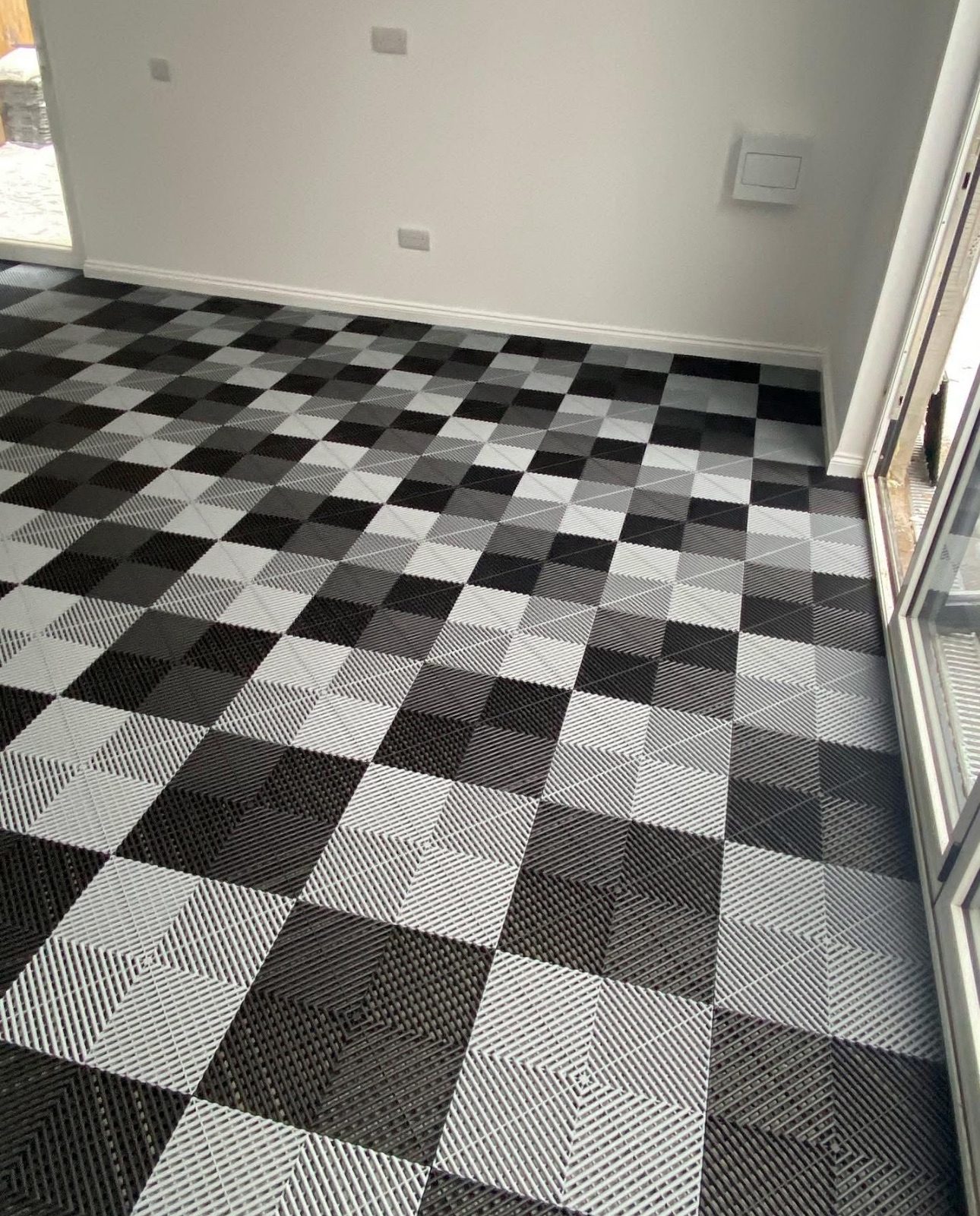 Indoor space with black and white large checkerboard